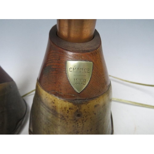 459 - A PAIR OF HORSE HOOF CANDLE STICKS, converted to table lamps, each with an attached shield inscribed... 