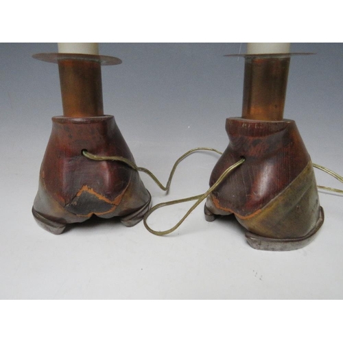 459 - A PAIR OF HORSE HOOF CANDLE STICKS, converted to table lamps, each with an attached shield inscribed... 