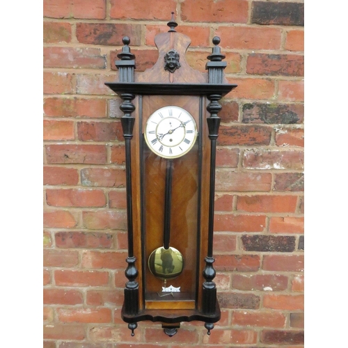 476 - A SLIM CASED 8 DAY VIENNA REGULATOR WALL CLOCK, the mahogany case having ebonised columns, the singl... 