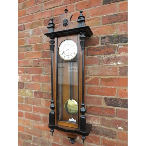 476 - A SLIM CASED 8 DAY VIENNA REGULATOR WALL CLOCK, the mahogany case having ebonised columns, the singl... 