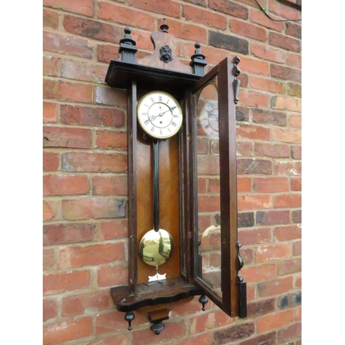 476 - A SLIM CASED 8 DAY VIENNA REGULATOR WALL CLOCK, the mahogany case having ebonised columns, the singl... 