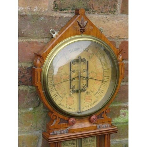 481 - A LATE 19TH CENTURY ROYAL POLYTECHNIC WALL BAROMETER, the oak case with large circular barometer sca... 