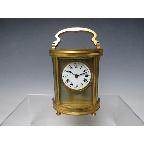 485 - A 19TH CENTURY FRENCH BRASS OVAL CARRIAGE CLOCK, H 11 cm