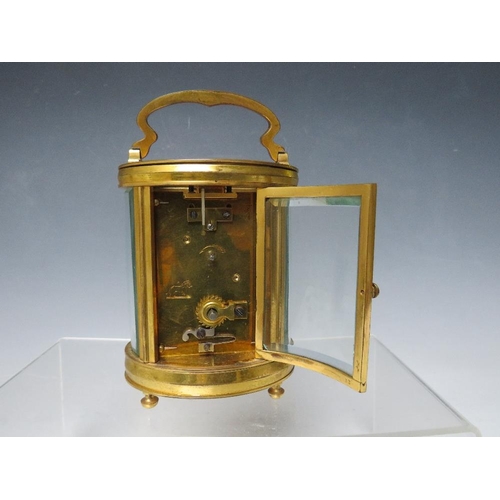 485 - A 19TH CENTURY FRENCH BRASS OVAL CARRIAGE CLOCK, H 11 cm