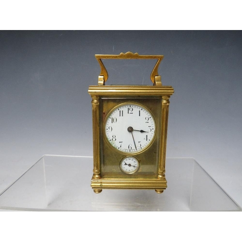 486 - A 19TH CENTURY FRENCH BRASS CARRIAGE ALARM CLOCK, H 10 cm