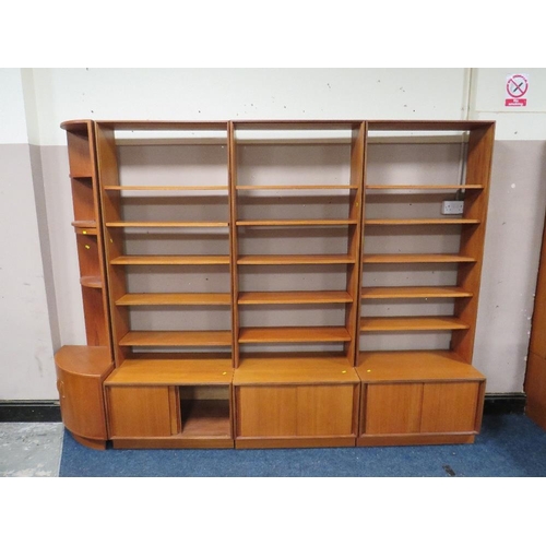 489 - A LARGE MID CENTURY G-PLAN TEAK DISPLAY UNIT, with corner section, in four sections, H 199, W 284 cm... 