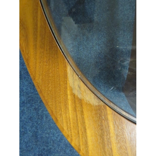 491 - A MID CENTURY G-PLAN TEAK AND GLASS OVAL COFFEE TABLE, H 41 cm, W 122 cm