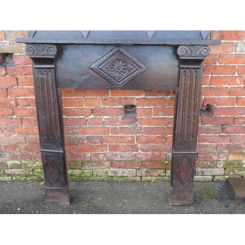 498 - A LATE 17TH / EARLY 18TH CENTURY AND LATER CARVED OAK FIRE SURROUND WITH MIRROR ABOVE, H 210 cm, W 1... 