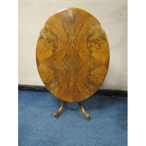 500 - A VICTORIAN WALNUT TILT-TOP LOO TABLE, the quarter veneered top having original snap lock mechanism,... 