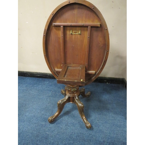 500 - A VICTORIAN WALNUT TILT-TOP LOO TABLE, the quarter veneered top having original snap lock mechanism,... 