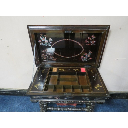 502 - A MID VICTORIAN EBONISED AND MOTHER OF PEARL WORK TABLE, the top opening to reveal numerous compartm... 