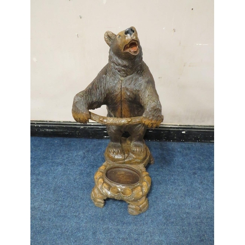 504 - A BLACK FOREST STYLE CARVED STANDING BEAR STICK STAND, with arms outstretched, H 89 cm