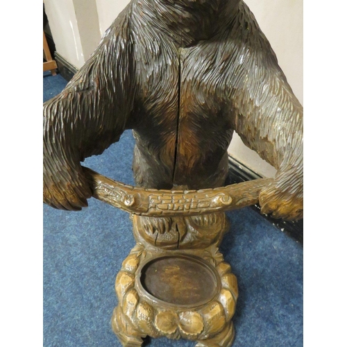 504 - A BLACK FOREST STYLE CARVED STANDING BEAR STICK STAND, with arms outstretched, H 89 cm