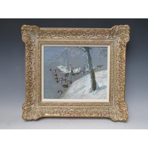 66 - VERNON WARD (1905-1985).  Winter lakeside scene with swans and ducks, signed on label verso, oil on ... 