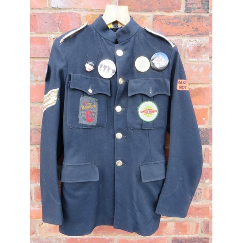 115 - A VINTAGE BLACK 'BEATLES' BLAZER / JACKET, with numerous vintage badges and patches