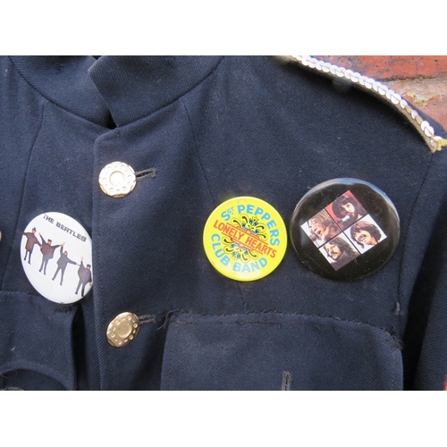 115 - A VINTAGE BLACK 'BEATLES' BLAZER / JACKET, with numerous vintage badges and patches