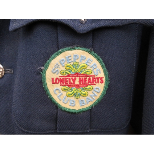 115 - A VINTAGE BLACK 'BEATLES' BLAZER / JACKET, with numerous vintage badges and patches