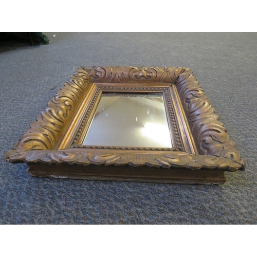 488 - A CIRCULAR CARVED WOOD AND GILT GESSO FRAMED CONVEX MIRROR, Dia. 56 cm, together with a gilt acanthu... 