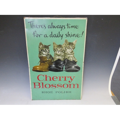 450 - A VINTAGE 'CHERRY BLOSSOM SHOE POLISH' ADVERTISING TIN SIGN, mounted on a board, 67.5 x 45 cm