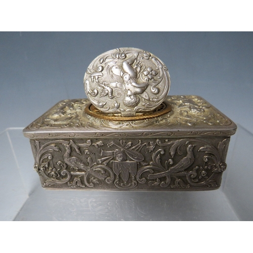 143 - A 19TH CENTURY CONTINENTAL SILVER AUTOMATON MUSICAL BIRD BOX, the case decorated with winged cherubs... 