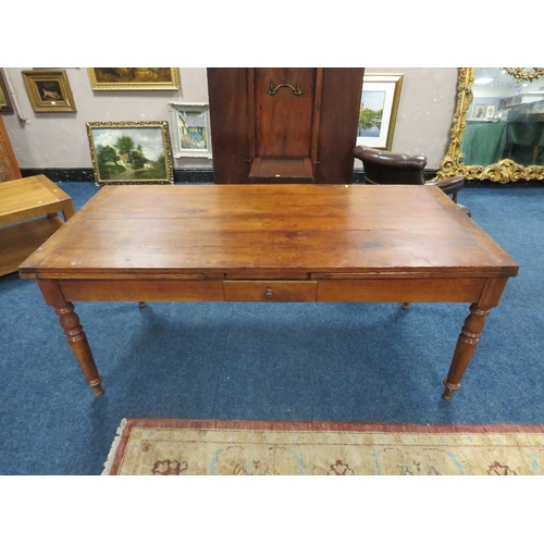 509 - A FRENCH PROVINCIAL DRAWLEAF FRUIT WOOD TABLE, with a single frieze drawer, raised on turned support... 