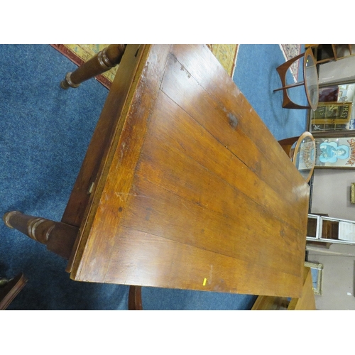 509 - A FRENCH PROVINCIAL DRAWLEAF FRUIT WOOD TABLE, with a single frieze drawer, raised on turned support... 