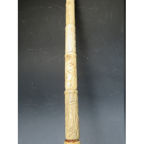 472 - A CARVED BONE WALKING STICK WITH HORN HANDLE, overall L 92 cm