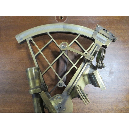 207 - A  BRASS SEXTANT IN AN HARDWOOD CASE