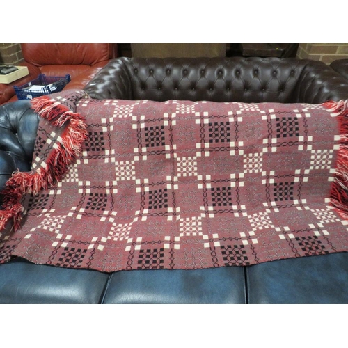 228 - A LARGE WOOL BLANKET WITH TASSEL EDGING