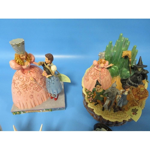 281 - TWO TINKERBELL FIGURES WITH TWO WIZARD OF OZ FIGURES AND A MODEL OF A TRACTOR (5)