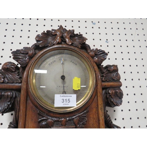 315 - AN ANTIQUE HEAVILY CARVED WALL BAROMETER A/F