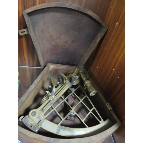 207 - A  BRASS SEXTANT IN AN HARDWOOD CASE