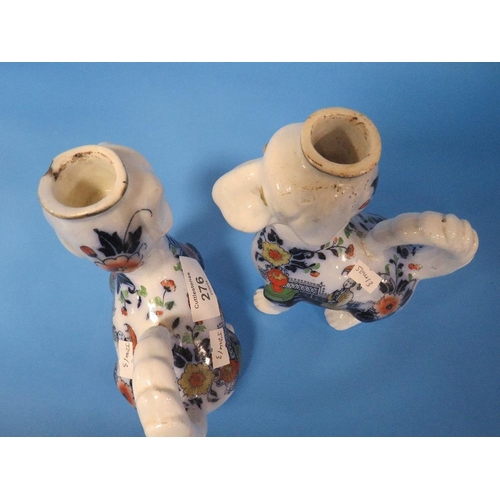 276 - TWO UNUSUAL 19TH CENTURY CHAMBER STICKS, IN THE FORM OF DOGS WITH CHINOISERIE DECORATION H 15.5 CM