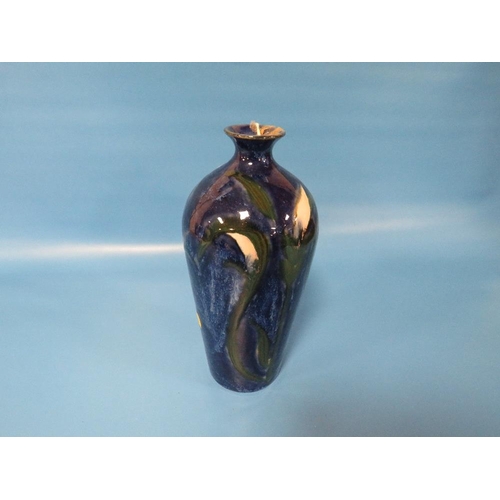 287 - A COBRIDGE TRIAL BALUSTER VASE, decorated with blue floral pattern, impressed factory marks, H 24 cm