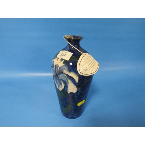 287 - A COBRIDGE TRIAL BALUSTER VASE, decorated with blue floral pattern, impressed factory marks, H 24 cm