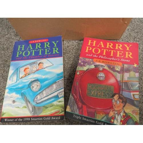 311 - A COLLECTION OF HARRY POTTER BOOKS TO INCLUDE FIRST EDITION PAPER BACK PRISONER OF AZKABAN & HARDBAC... 