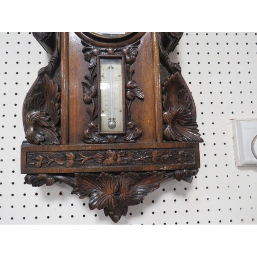 315 - AN ANTIQUE HEAVILY CARVED WALL BAROMETER A/F