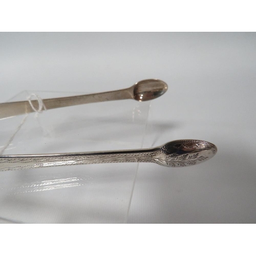 335 - A PAIR OF GEORGIAN HALLMARKED SILVER BRIGHT CUT SUGAR TONGS