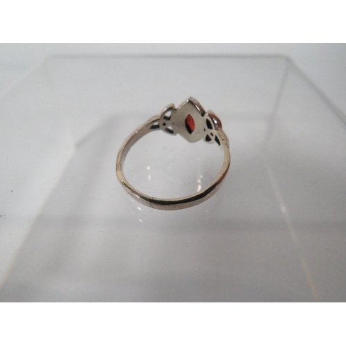 348 - A DECORATIVE SILVER DRESS RING