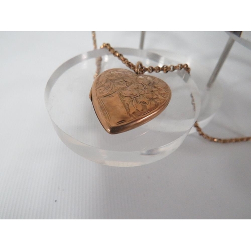 362 - AN ANTIQUE LOCKET AND CHAIN - LOCKET MARKED 9CT BACK AND FRONT