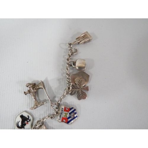 368 - A VINTAGE SILVER CHARM BRACELET