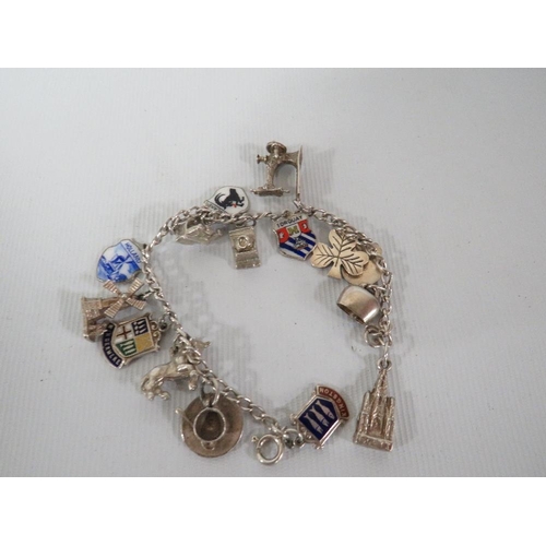 368 - A VINTAGE SILVER CHARM BRACELET