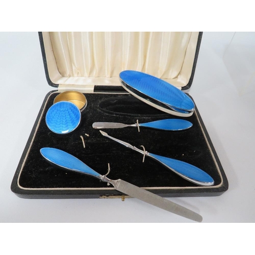 388 - A CASED BLUE GUILLOCHE ENAMEL CHROME VANITY SET (MISSING SCISSORS)