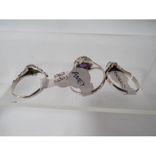 392 - THREE SILVER DECORATIVE  DRESS RINGS TO INCLUDE A TIGER EYE EXAMPLE