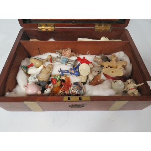 412 - A VICTORIAN MAHOGANY WRITING BOX, CONTAINING A COLLECTION OF MINIATURE ANIMALS, FIGURES ETC