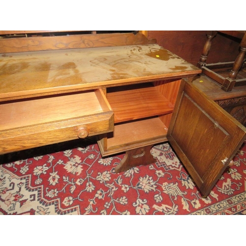 836 - AN OAK GOTHIC DRESSING TABLE