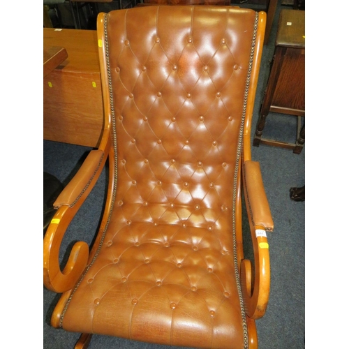 841 - A REPRODUCTION ROCKING CHAIR