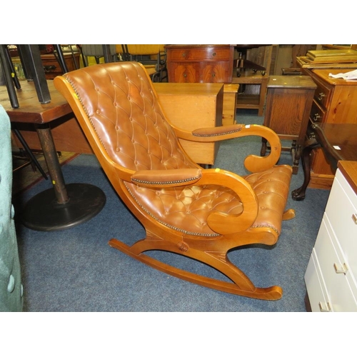 841 - A REPRODUCTION ROCKING CHAIR