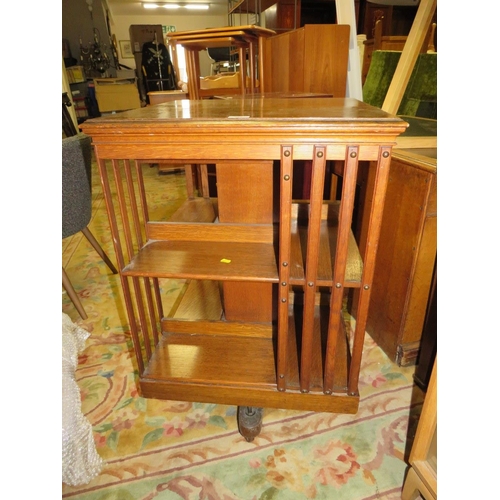 858 - A VINTAGE OAK REVOLVING BOOKCASE