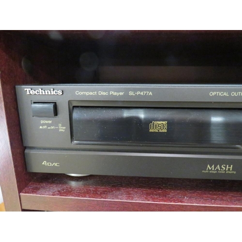 859 - A TECHNICS SU-V570 AMP AND AN SL-P477A CD PLAYER IN CABINET